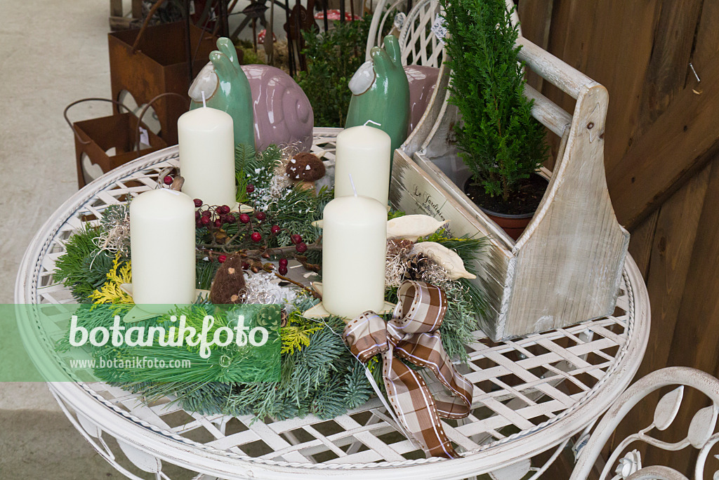 527023 - Advent wreath on a white table