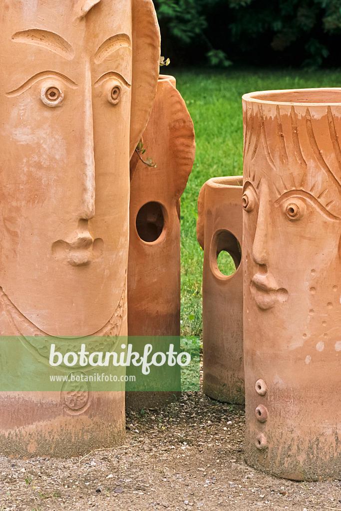 380072 - Artistic flower pots and garden sculptures made of clay with modelled faces