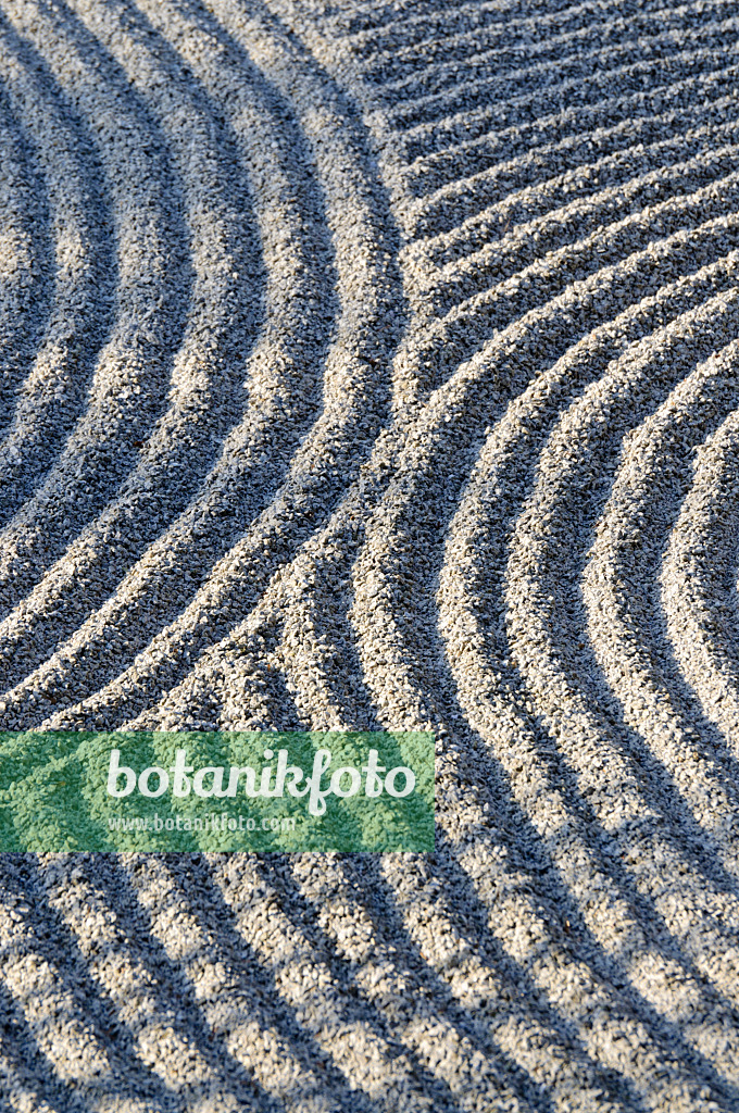 483291 - Curvaceous gravel in the sun in a dry landscape garden