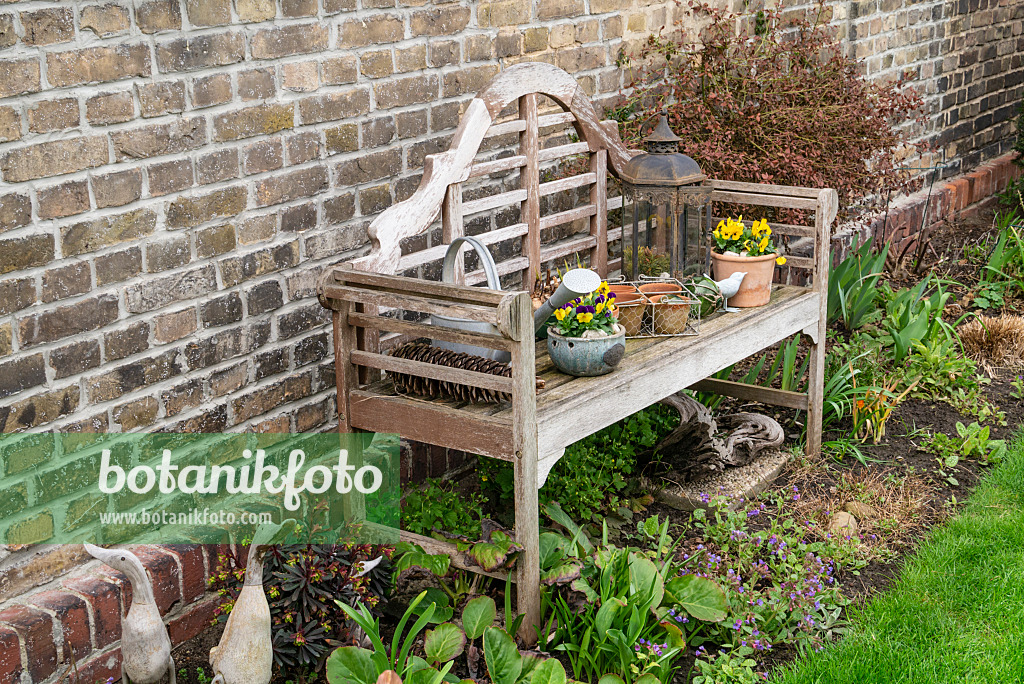 625028 - Garden bench with spring decoration