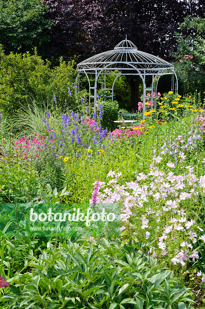 474087 - Rich flowering garden with pavilion