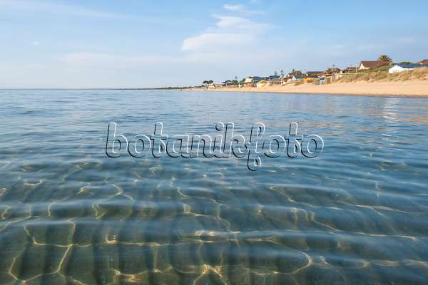 455195 - Beach with clear water and sun reflections at Port Phillip Bay, Frankston, Australia