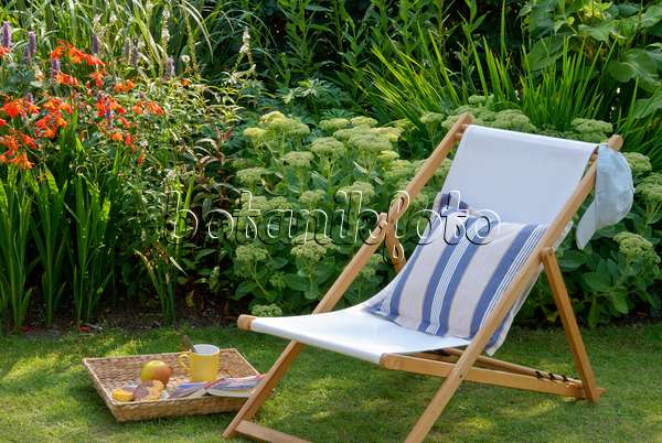 456029 - Deck chair on a lawn