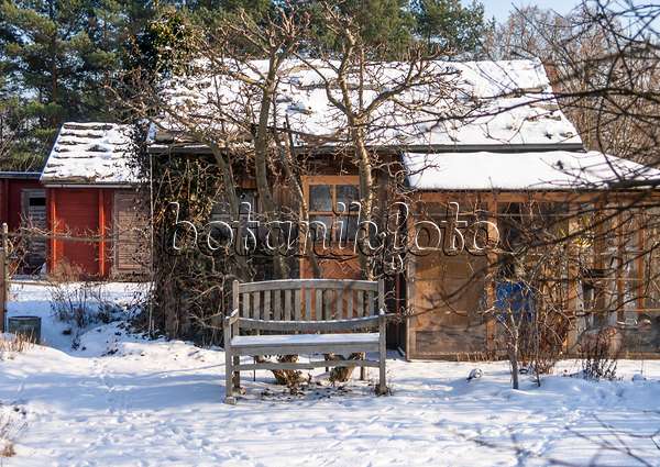 516037 - Garden house in a snowy natural garden