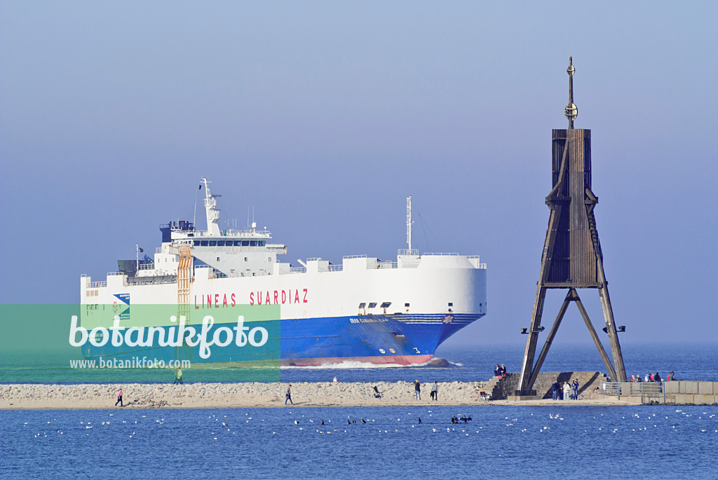 525098 - Kugelbake and transport ship at Elbe River Mouth, Cuxhaven, Germany