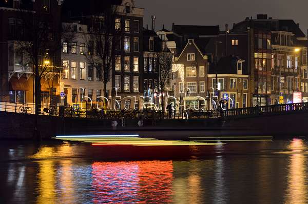 564009 - Light tracks of canal boats, Amsterdam, Netherlands