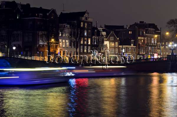 564010 - Light tracks of canal boats, Amsterdam, Netherlands