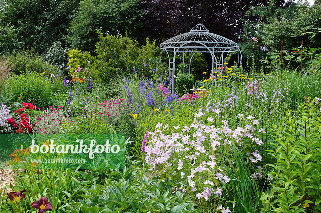 474086 - Rich flowering garden with pavilion