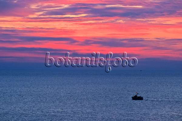382030 - Sunset with a trawler on the Baltic Sea, Germany