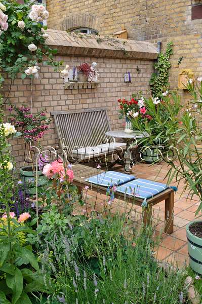 473247 - Terrace of a backyard garden with seating area