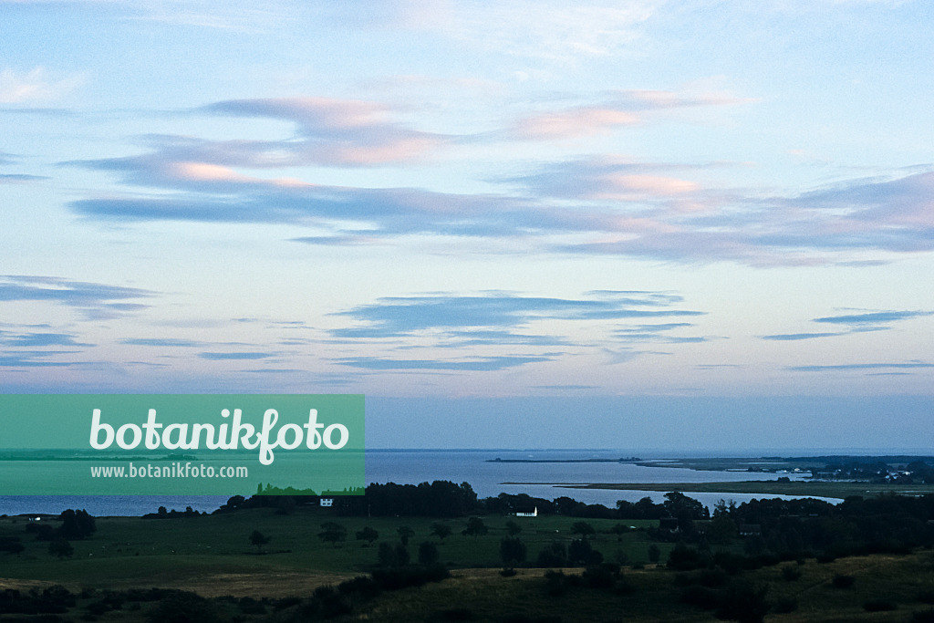 382027 - Evening clouds in the bluish light above the sea, Hiddensee, Germany