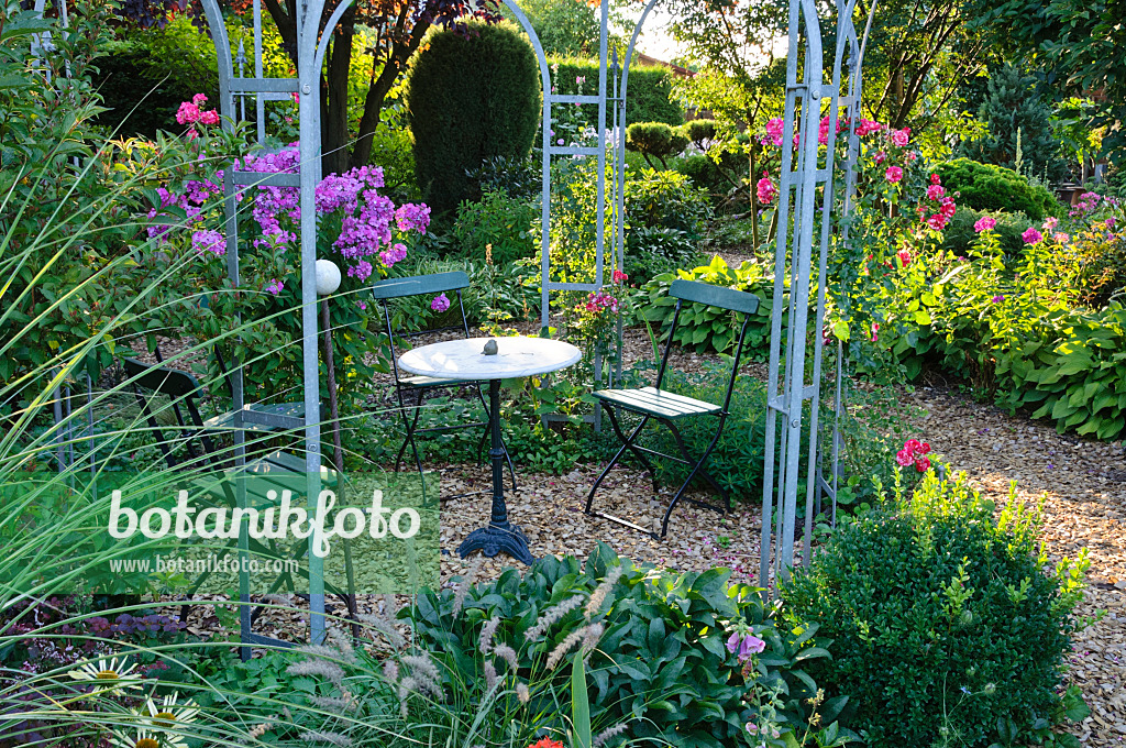 474474 - Seating area in a garden pavilion