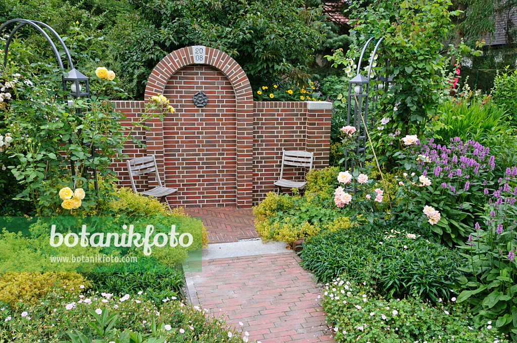 474057 - Seating area in a rose garden