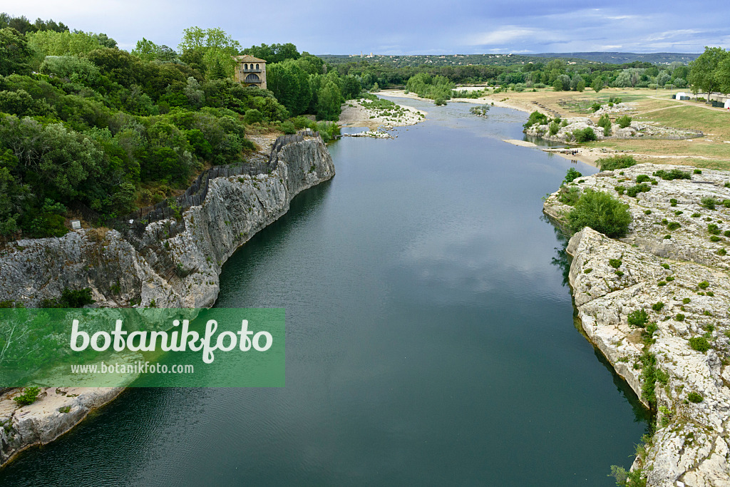 557086 - Stone banks with evergreen shrubs, Gardon, Languedoc-Roussillon, France