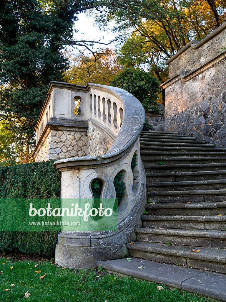 465298 - Wide winding stone staircase with stone railing and well-kept lawn, Römischer Garten, Hamburg, Germany