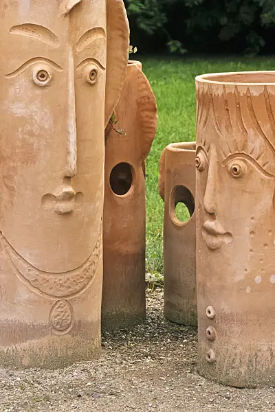 380072 - Artistic flower pots and garden sculptures made of clay with modelled faces