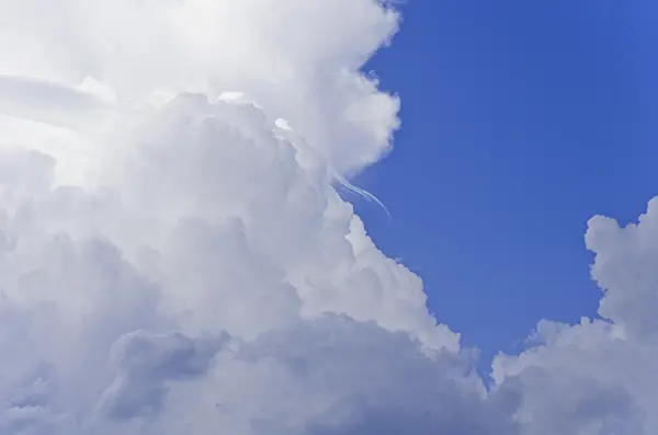 571002 - Cumulonimbus clouds with blue sky