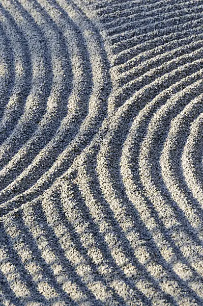 483291 - Curvaceous gravel in the sun in a dry landscape garden