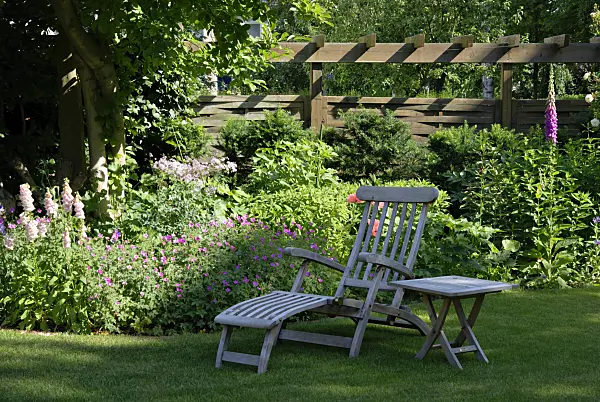 452115 - Deck chair in a garden