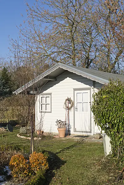 565049 - Garden house in a wintery allotment garden