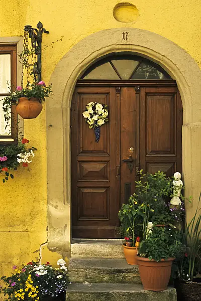 378142 - House entrance with potted plants