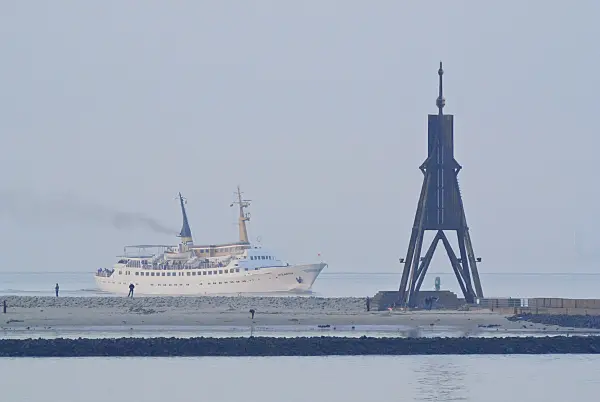 525105 - Kugelbake and excursion boat at Elbe River Mouth, Cuxhaven, Germany