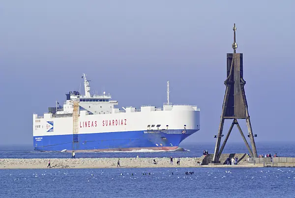 525098 - Kugelbake and transport ship at Elbe River Mouth, Cuxhaven, Germany