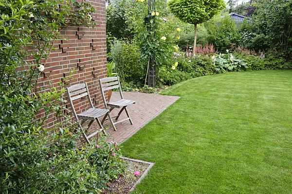 474052 - Lawn with garden chairs