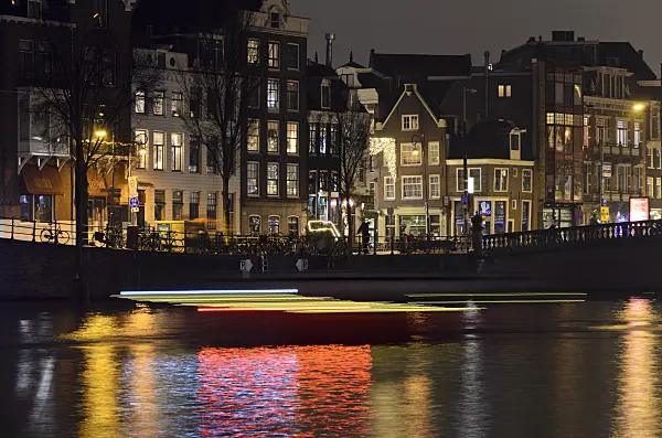 564009 - Light tracks of canal boats, Amsterdam, Netherlands