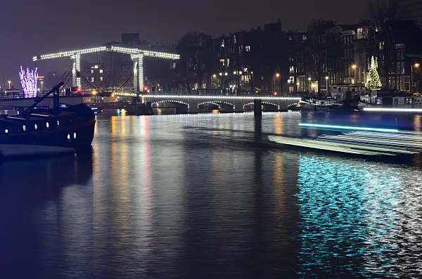 564012 - Light tracks of canal boats, Amsterdam, Netherlands