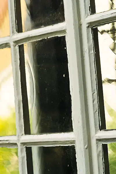 381093 - Muntin window with glass panes of an old garden house