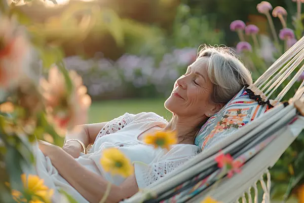 667016 - Relaxed woman in a hammock
