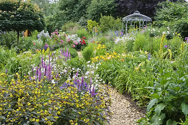 474085 - Rich flowering garden with pavilion