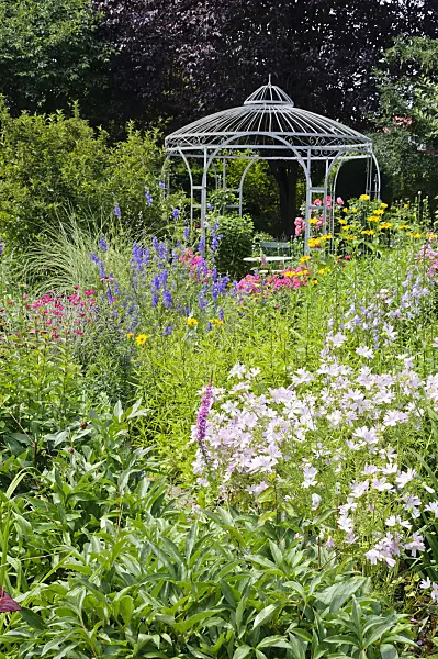 474087 - Rich flowering garden with pavilion