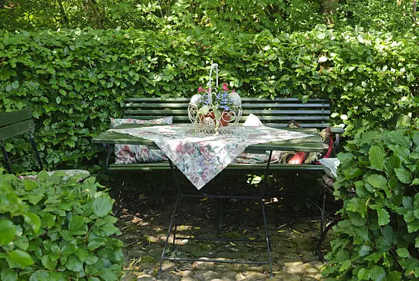 500196 - Seating area at a beech hedge
