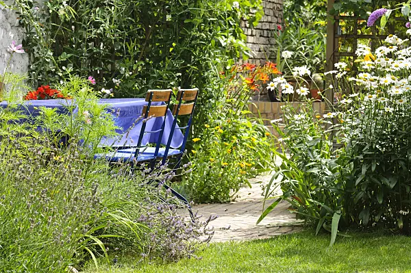 474373 - Seating area in a backyard garden