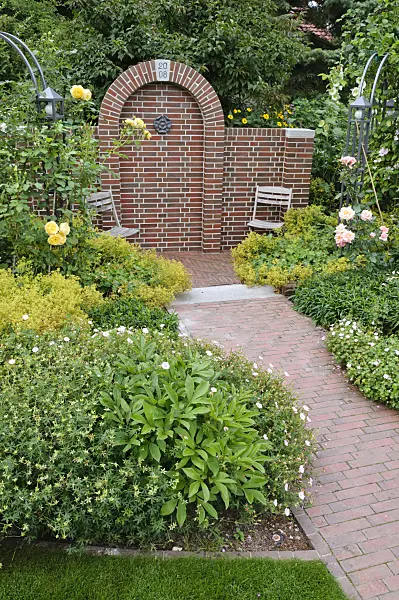 474058 - Seating area in a rose garden