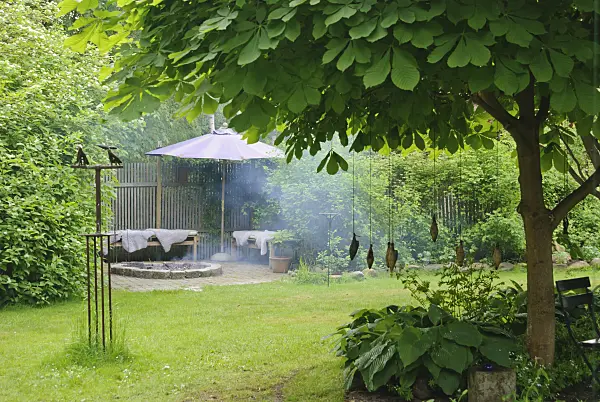 509142 - Seating area with fireplace in a garden