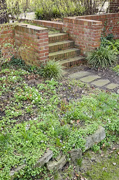 471050 - Spring garden with brick staircase