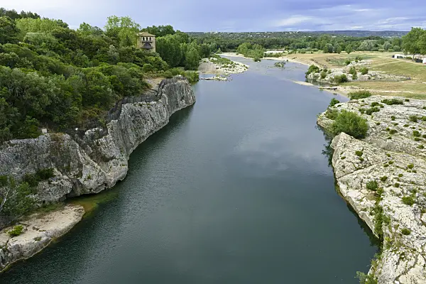 557086 - Stone banks with evergreen shrubs, Gardon, Languedoc-Roussillon, France
