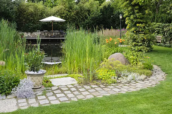 474050 - Swimming pond with wooden decking area and seats