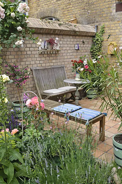 473247 - Terrace of a backyard garden with seating area