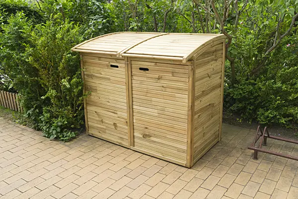 532031 - Trash bins with wooden lids on a terrace with stone tiles