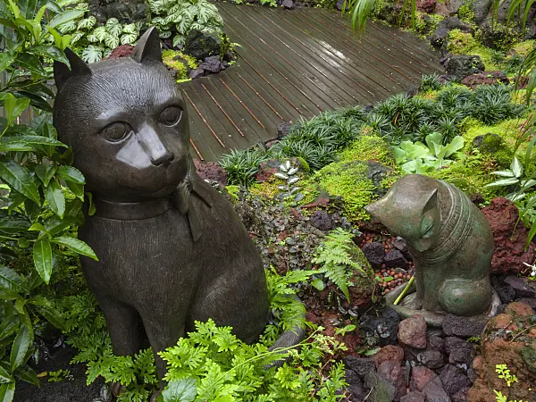 411192 - Tropical garden with sculptures, National Orchid Garden, Singapore