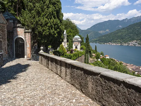 414102 - View of Lake Lugano and the mountains with cloudy skies from the cemetery, Morcote, Switzerland