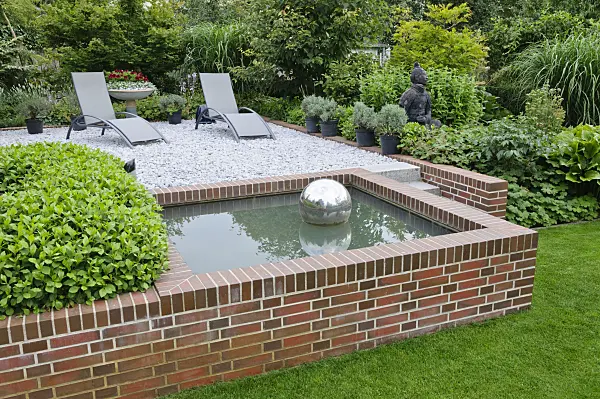 474062 - Water basin with deck chairs