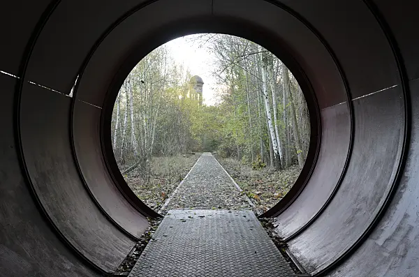 526014 - Water tower and hiking trail on an abandoned railway station, Südgelände Nature Park, Berlin, Germany