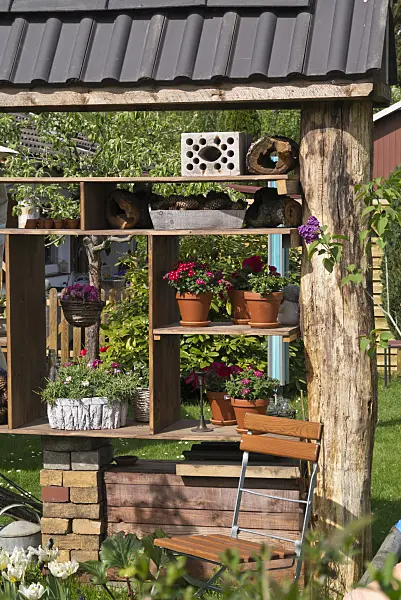 544096 - Wooden shelf with flower pots