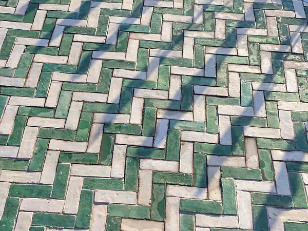429038 - Zigzagged laid white and green ornamental ceramic tiles